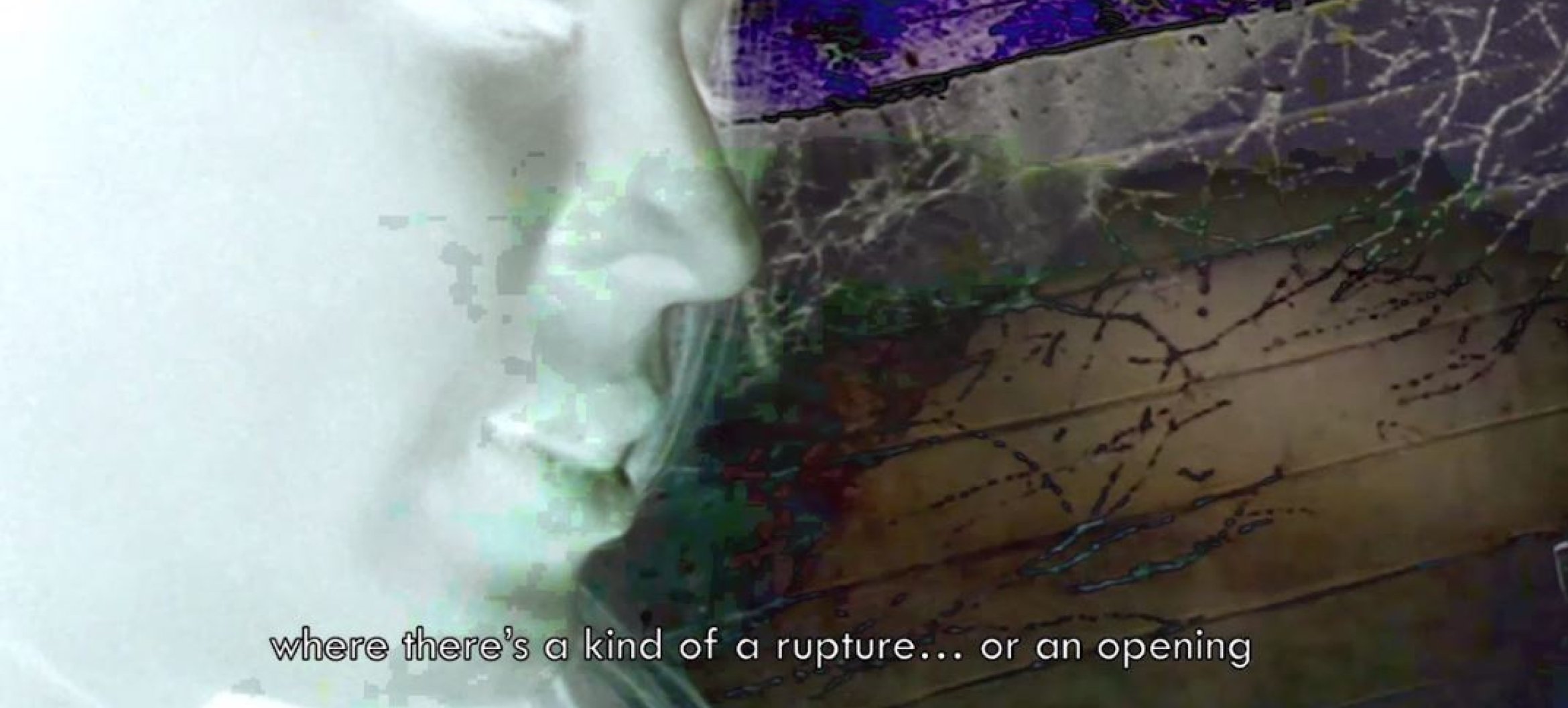 Sentient Encounters filmavond: A Paper folded in half with a pen punched through it