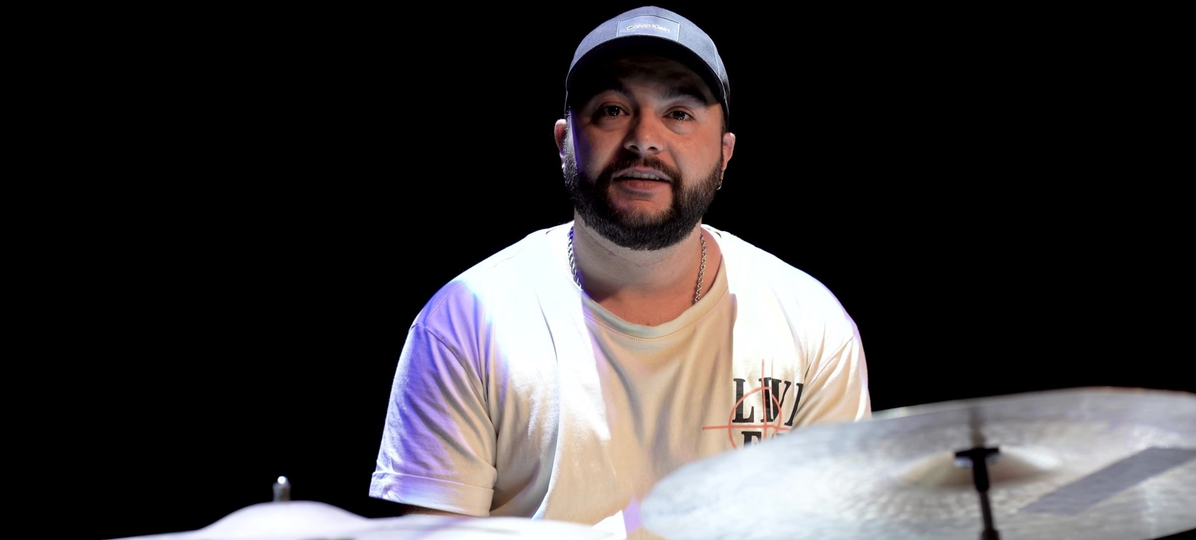 Volkan combines drums with storytelling, visuals and spoken word