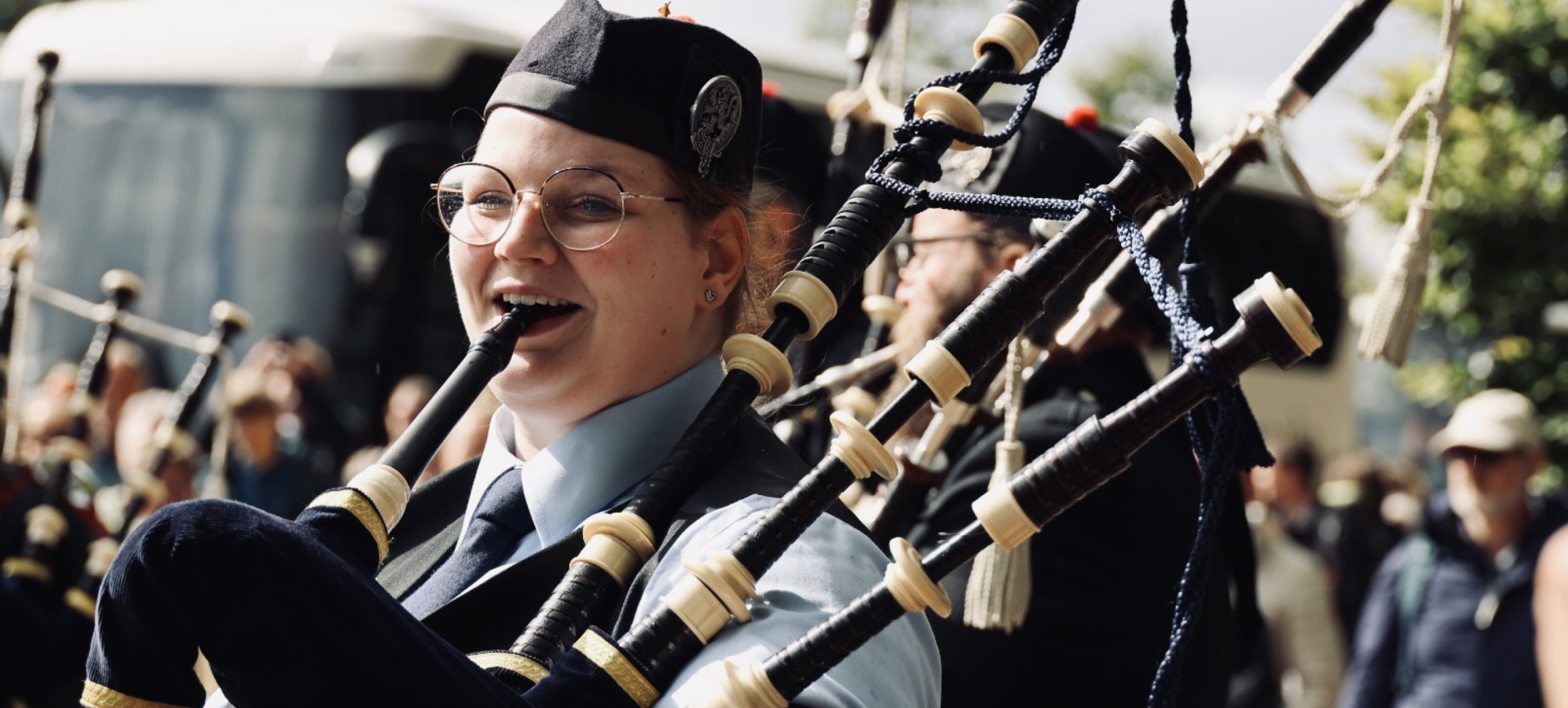 A first: Megan graduates on the bagpipes
